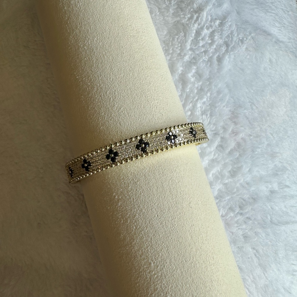 Elegant Gold and Black Bracelet